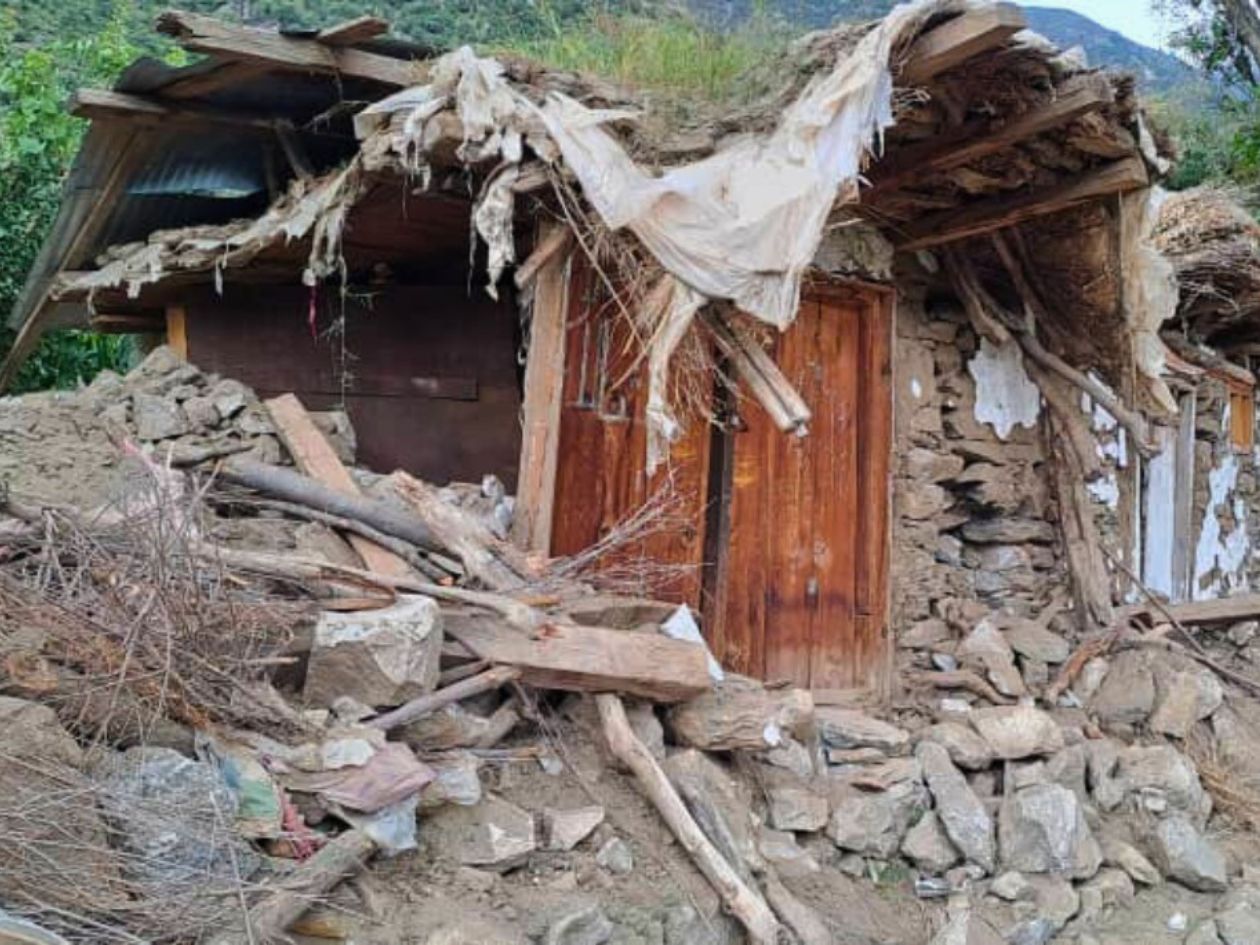Severely damaged sun-dried brick house