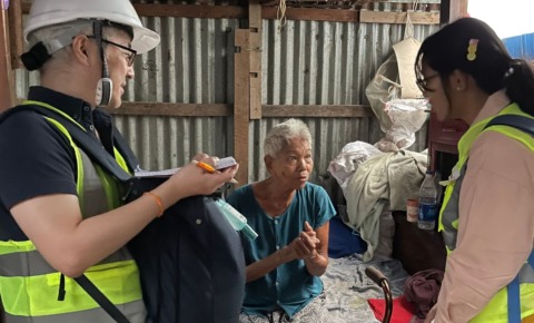 AAR staff member listening to an earthquake survivor