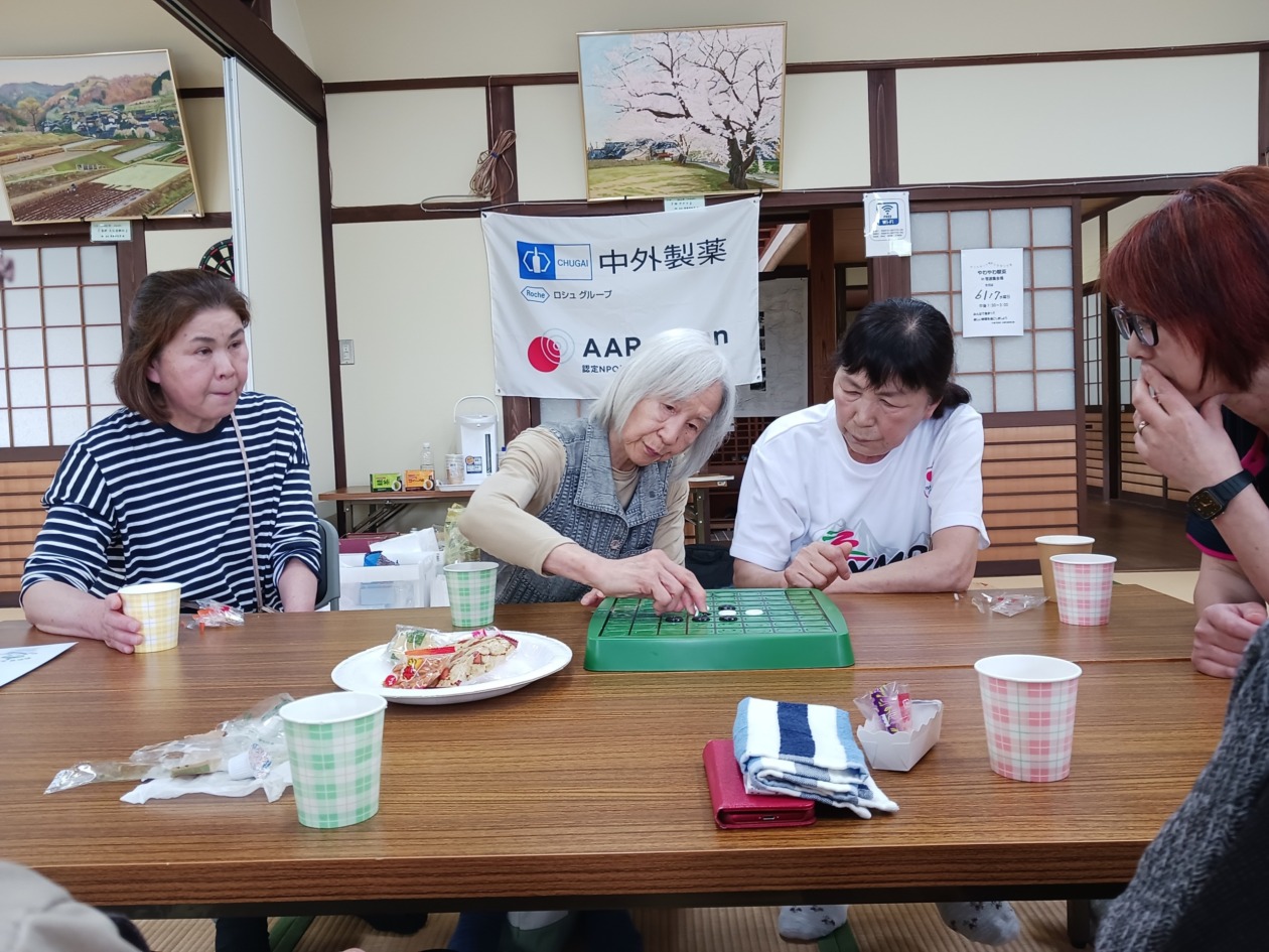 women are sitting and talking